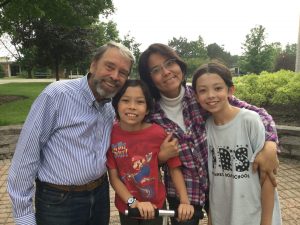 Pearce Church partners Chris and Yuko Wilkins and family, Japan