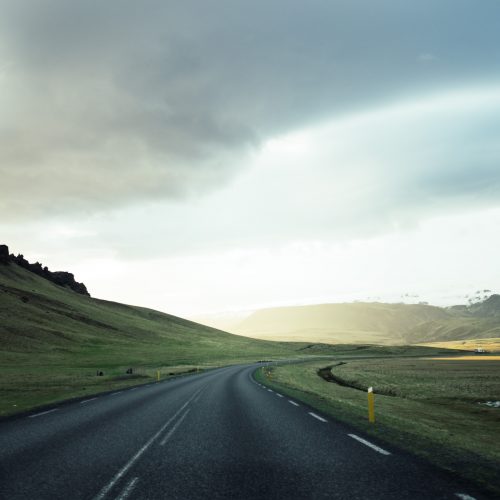 Looking towards the distant horizon along a winding road